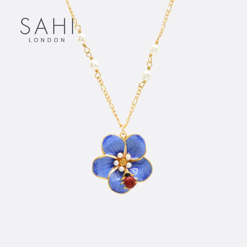 Forget Me Not Pendant Necklace 18CT Gold Plated | Sahi London Check out pendant necklace jewellery sale for woman on our forget me not pendent necklace collection, visit our latest pendant designs for girls and woman from sahi london UK, Purchase this beautiful 18CT gold plated pendant necklace for woman which reflects the real charm of your personality