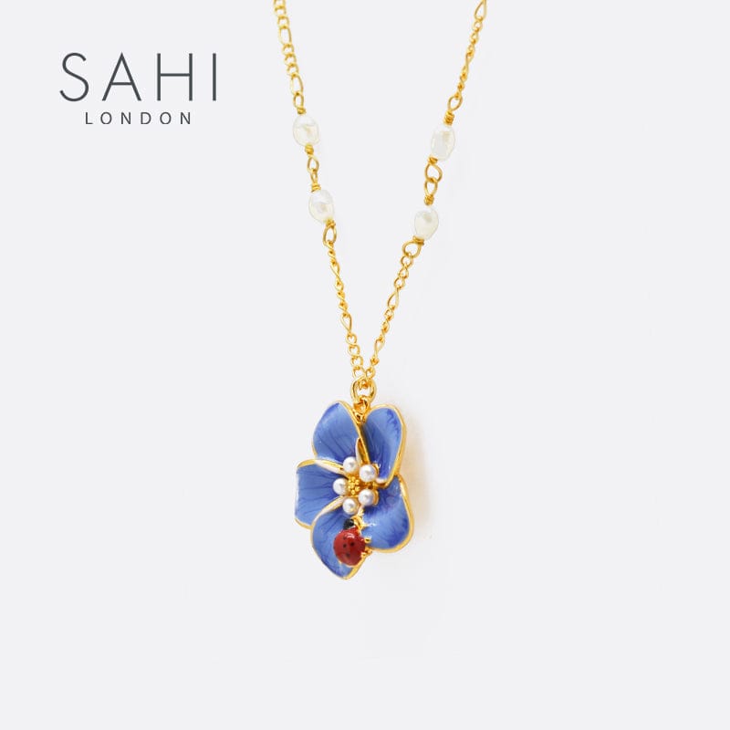 Forget Me Not Pendant Necklace 18CT Gold Plated | Sahi London Check out pendant necklace jewellery sale for woman on our forget me not pendent necklace collection, visit our latest pendant designs for girls and woman from sahi london UK, Purchase this beautiful 18CT gold plated pendant necklace for woman which reflects the real charm of your personality